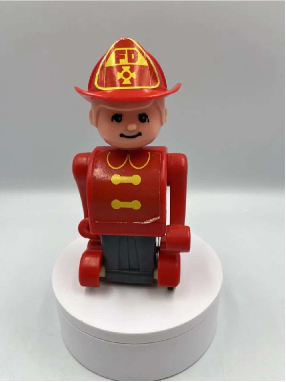 VINTAGE PUSHKINS Vintage Fire Man TOMY 1976 Push N Go Action Figure